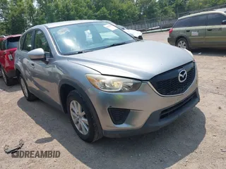 2014 Mazda CX-5 Sport z VIN JM3KE4BE9E0411177, wystawiony jako IAAI lot #42411938 z przebiegiem 167 709 mil mil oraz . Historia ofert i sprzedaży dostępna na DreamBid. Obrazek 1.
