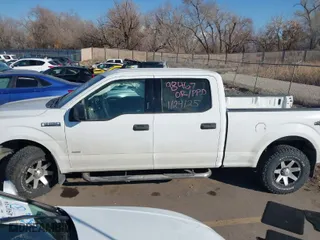 2015 Ford F-150 XLT w/HD Payload Pkg with VIN 1FTFW1EG7FFB09470, listed as a IAAI auction lot 41455246 with 152,766 mi miles. Bid and sale history available at carsss.com. Image 14.