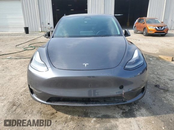 2022 Tesla Model Y Performance with VIN 7SAYGDEF4NF447462, listed as a Copart auction lot 58306595 with 61,671 mi miles and Non repairable. Bid and sale history available at DreamBid. Image 5.