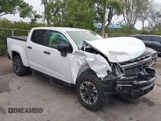 2022 Chevrolet Colorado 4WD Z71 z VIN 1GCGTDEN7N1332410, wystawiony jako IAAI lot #41417749 z przebiegiem 61 485 mil mil oraz . Historia ofert i sprzedaży dostępna na DreamBid. Obrazek 1.