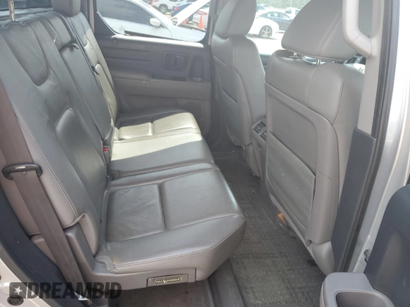 2014 Honda Ridgeline RTL with VIN 5FPYK1F58EB012869, listed as a Copart auction lot 51854995 with 318,950 mi miles and Salvage title. Bid and sale history available at DreamBid. Image 10.