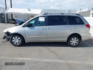 2005 Toyota Sienna CE with VIN 5TDZA23C95S261007, listed as a IAAI auction lot 42130492 with 215,717 mi miles and . Bid and sale history available at DreamBid. Image 14.