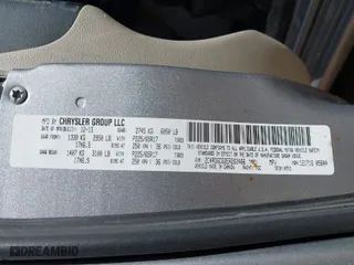 2014 Dodge Grand Caravan SXT with VIN 2C4RDGCG2ER262466, listed as a IAAI auction lot 41928445 with 218,380 mi miles. Bid and sale history available at carsss.com. Image 9.