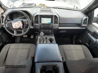 2017 Ford F-150 XL with VIN 1FTFX1EF4HFC57454, listed as a Copart auction lot 57087675 with 127,534 mi miles and Salvage title. Bid and sale history available at DreamBid. Image 8.
