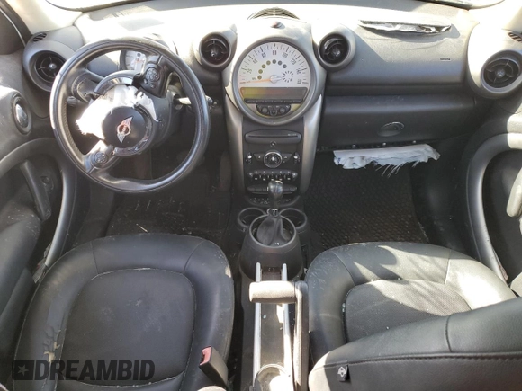 2011 MINI Countryman with VIN WMWZB3C59BWH94541, listed as a Copart auction lot 87177514 with 186,979 mi miles and Salvage title. Bid and sale history available at DreamBid. Image 8.