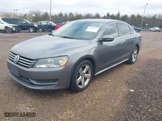 2012 Volkswagen Passat SE with VIN 1VWBH7A3XCC054344, listed as a IAAI auction lot 41290377 with 195,009 mi miles. Bid and sale history available at carsss.com. Image 2.