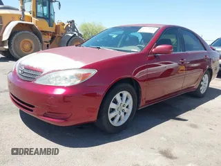 2002 Toyota Camry LE z VIN 4T1BE32K52U082454, wystawiony jako IAAI lot #42276881 z przebiegiem 225 814 mil mil oraz . Historia ofert i sprzedaży dostępna na DreamBid. Obrazek 2.