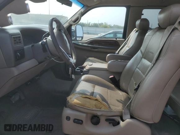 2001 Ford F-350 XL with VIN 1FTSX31F11ED72055, listed as a Copart auction lot 66164624 with 228,597 mi miles and Salvage Title. Bid and sale history available at DreamBid. Image 7.