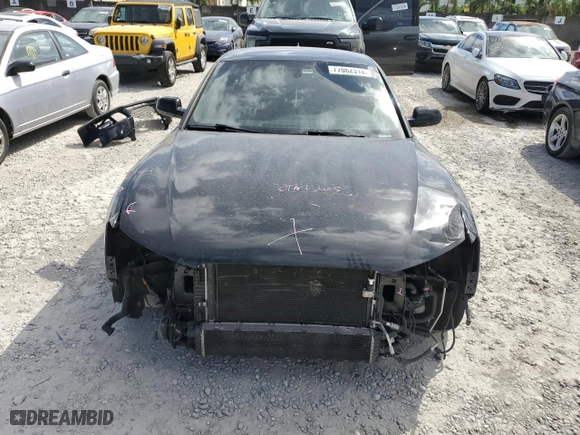 2016 Audi S5 Premium Plus with VIN WAUC4AFR7GA005663, listed as a Copart auction lot 77062314 with 98,492 mi miles and Salvage Title. Bid and sale history available at carsss.com. Image 5.