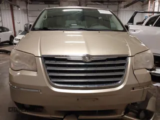 2010 Chrysler Town & Country Limited with VIN 2A4RR7DX5AR386462, listed as a IAAI auction lot 41781713 with 183,091 mi miles and . Bid and sale history available at carsss.com. Image 13.