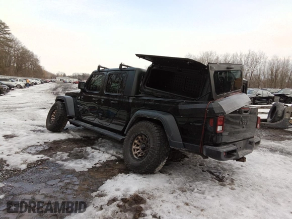 2021 Jeep Gladiator Willys with VIN 1C6HJTAG7ML595714, listed as a Copart auction lot 47096425 with 90,728 mi miles and Salvage Title. Bid and sale history available at carsss.com. Image 2.