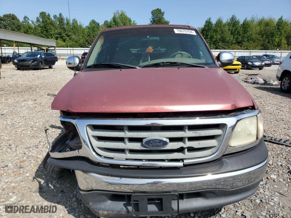 2001 Ford F-150 SuperCrew XLT with VIN 1FTRW07L91KE48149, listed as a Copart auction lot 70670704 with 0 mi miles and Salvage Title. Bid and sale history available at carsss.com. Image 5.
