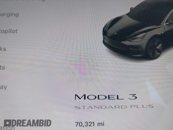 2019 Tesla Model 3 Mid Range with VIN 5YJ3E1EA2KF362048, listed as a IAAI auction lot 40141734 with 70,321 mi miles and . Bid and sale history available at carsss.com. Image 7.