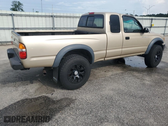 2002 Toyota Tacoma with VIN 5TEWM72N12Z093226, listed as a Copart auction lot 61019955 with 103,657 mi miles and Clean title. Bid and sale history available at DreamBid. Image 3.