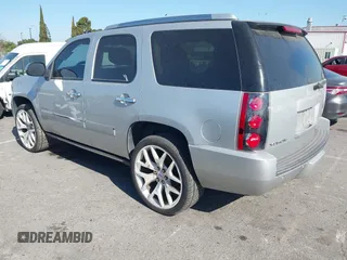 2011 GMC Yukon Denali with VIN 1GKS2EEF3BR350688, listed as a IAAI auction lot 41993776 with 241,941 mi miles. Bid and sale history available at carsss.com. Image 3.