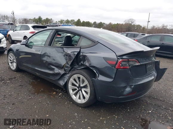 2022 Tesla Model 3 with VIN 5YJ3E1EA6NF143839, listed as a IAAI auction lot 40905007 with 83,897 mi miles and . Bid and sale history available at DreamBid. Image 6.