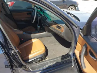 2011 BMW 3 Series 328i with VIN WBAPH7C55BE131127, listed as a IAAI auction lot 41860588 with 260,158 mi miles. Bid and sale history available at carsss.com. Image 5.