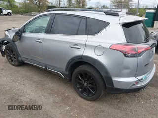 2018 Toyota RAV4 XLE with VIN 2T3RFREV1JW718474, listed as a IAAI auction lot 42144572 with 62,852 mi miles and . Bid and sale history available at DreamBid. Image 3.