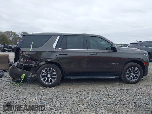 2021 Chevrolet Tahoe LT with VIN 1GNSCNKD7MR439900, listed as a IAAI auction lot 41187590 with 119,131 mi miles and . Bid and sale history available at DreamBid. Image 14.