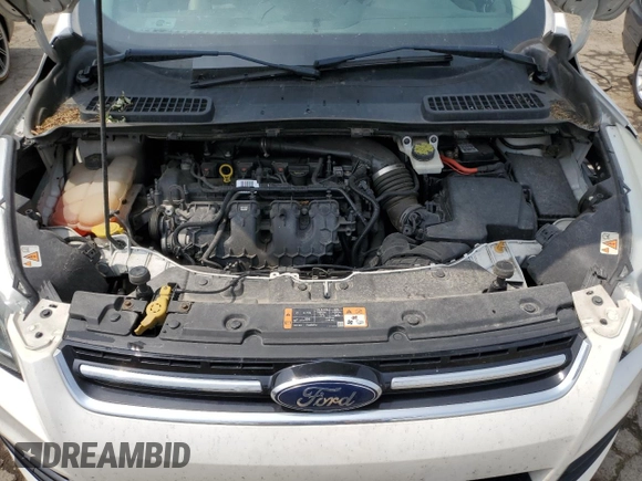 2015 Ford Escape Titanium с VIN 1FMCU9J95FUC87156, выставлен на аукционе Copart как лот 60097165 с пробегом 111 275 миль миль и Списание • Salvage title. История ставок и продаж доступна на DreamBid. Изображение 12.