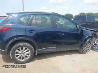 2016 Mazda CX-5 Sport z VIN JM3KE2BY0G0633611, wystawiony jako IAAI lot #42390654 z przebiegiem Nie podano mil oraz . Historia ofert i sprzedaży dostępna na DreamBid. Obrazek 14.