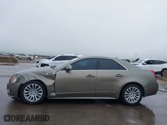 2010 Cadillac CTS with VIN 1G6DK5EG0A0137216, listed as a IAAI auction lot 41966117 with 177,686 mi miles and . Bid and sale history available at DreamBid. Image 14.