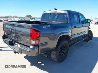 2023 Toyota Tacoma 4WD SR with VIN 3TYCZ5AN1PT146719, listed as a IAAI auction lot 41406963 with 19,735 mi miles. Bid and sale history available at carsss.com. Image 4.