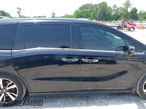 2018 Honda Odyssey Elite z VIN 5FNRL6H91JB109378, wystawiony jako IAAI lot #42270766 z przebiegiem 156 873 mil mil oraz . Historia ofert i sprzedaży dostępna na DreamBid. Obrazek 13.