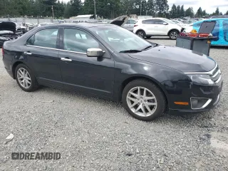 2012 Ford Fusion SEL z VIN 3FAHP0JG2CR433596, wystawiony jako Copart lot #59769105 z przebiegiem 126 230 mil mil oraz Czysty tytuł • Clean title. Historia ofert i sprzedaży dostępna na DreamBid. Obrazek 4.