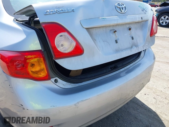 2010 Toyota Corolla with VIN 2T1BU4EEXAC298637, listed as a IAAI auction lot 42036415 with 103,885 mi miles. Bid and sale history available at carsss.com. Image 15.