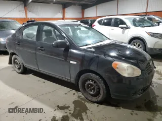 2007 Hyundai Accent GL z VIN KMHCN45C87U142295, wystawiony jako Copart lot #86149894 z przebiegiem 325 738 mil mil oraz Szkoda całkowita • Salvage title. Historia ofert i sprzedaży dostępna na DreamBid. Obrazek 4.