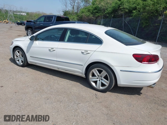 2013 Volkswagen CC Sport with VIN WVWBP7AN0DE523261, listed as a IAAI auction lot 42106039 with 136,105 mi miles. Bid and sale history available at carsss.com. Image 3.