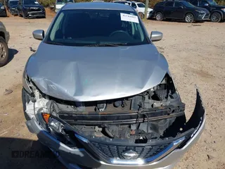 2017 Nissan Sentra S z VIN 3N1AB7AP4HY244967, wystawiony jako IAAI lot #41741001 z przebiegiem 144 817 mil mil oraz . Historia ofert i sprzedaży dostępna na DreamBid. Obrazek 6.