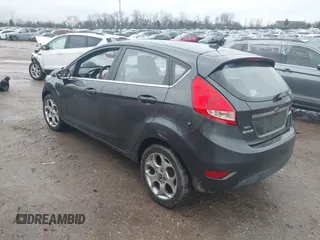 2011 Ford Fiesta SES with VIN 3FADP4FJ7BM111381, listed as a IAAI auction lot 41226251 with 93,694 mi miles. Bid and sale history available at carsss.com. Image 3.
