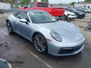 2020 Porsche 911 Carrera S with VIN WP0CB2A97LS262106, listed as a IAAI auction lot 42011151 with 63,444 mi miles. Bid and sale history available at carsss.com. Image 1.