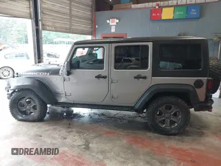 2017 Jeep Wrangler Unlimited Rubicon Recon z VIN 1C4BJWFG5HL687757, wystawiony jako IAAI lot #42367095 z przebiegiem 48 441 mil mil oraz . Historia ofert i sprzedaży dostępna na DreamBid. Obrazek 14.