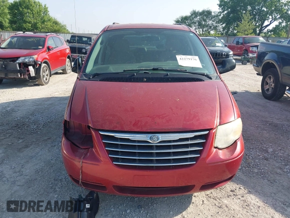 2007 Chrysler Town & Country LX z VIN 2A4GP44R87R190635, wystawiony jako IAAI lot #42279176 z przebiegiem 115 920 mil mil oraz . Historia ofert i sprzedaży dostępna na DreamBid. Obrazek 12.