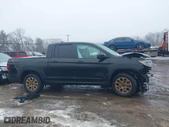 2021 Honda Ridgeline Sport with VIN 5FPYK3F12MB002877, listed as a IAAI auction lot 41576812 with 51,658 mi miles and . Bid and sale history available at DreamBid. Image 14.