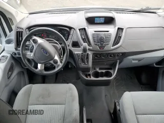 2015 Ford Transit Cargo with VIN 1FTYE1CM7FKA24477, listed as a Copart auction lot 86310214 with 54,098 mi miles and Salvage title. Bid and sale history available at DreamBid. Image 8.