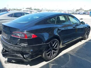 2021 Tesla Model S Long Range z VIN 5YJSA1E54MF429360, wystawiony jako IAAI lot #42662440 z przebiegiem 36 395 mil mil oraz . Historia ofert i sprzedaży dostępna na DreamBid. Obrazek 4.