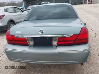 2005 Mercury Grand Marquis LS Premium z VIN 2MEHM75W45X662040, wystawiony jako IAAI lot #41697234 z przebiegiem 214 410 mil mil oraz . Historia ofert i sprzedaży dostępna na DreamBid. Obrazek 17.