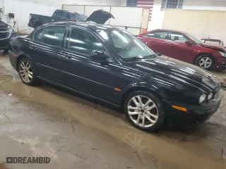 2005 Jaguar X-Type 3.0L with VIN SAJWA51C05WE41522, listed as a Copart auction lot 62837564 with 91,885 mi miles and Clean Title. Bid and sale history available at carsss.com. Image 4.