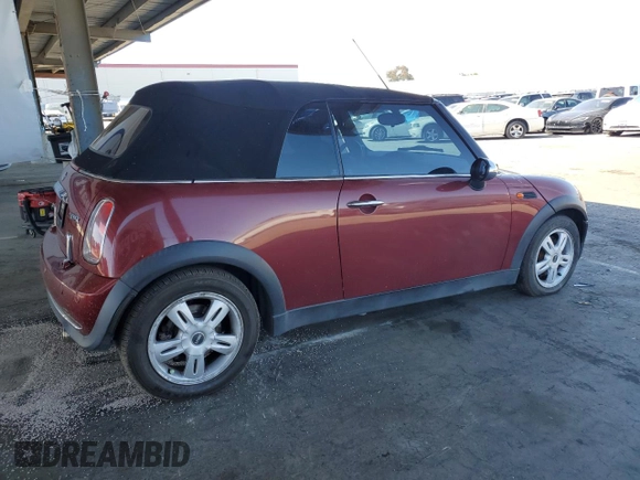 2007 MINI Convertible with VIN WMWRF33537TG17447, listed as a Copart auction lot 59015995 with 137,032 mi miles and Salvage title. Bid and sale history available at DreamBid. Image 3.