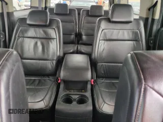 2009 Ford Flex SEL z VIN 2FMEK62CX9BA14490, wystawiony jako Copart lot #58776655 z przebiegiem 214 426 mil mil oraz Szkoda całkowita • Salvage title. Historia ofert i sprzedaży dostępna na DreamBid. Obrazek 10.