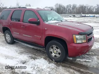 2007 Chevrolet Tahoe LTZ z VIN 1GNFK130X7J143815, wystawiony jako IAAI lot #41567270 z przebiegiem 201 252 mil mil oraz . Historia ofert i sprzedaży dostępna na DreamBid. Obrazek 1.