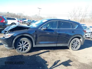 2017 Mazda CX-5 Grand Touring with VIN JM3KFBDL0H0104806, listed as a IAAI auction lot 41621964 with 60,728 mi miles. Bid and sale history available at carsss.com. Image 15.