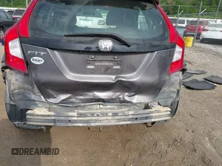 2015 Honda Fit LX with VIN 3HGGK5H58FM722880, listed as a IAAI auction lot 42276261 with 104,886 mi miles and . Bid and sale history available at DreamBid. Image 6.