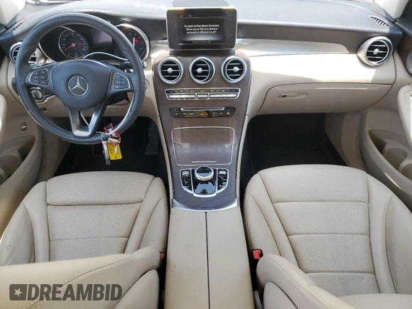 2019 Mercedes-Benz GLC 300 with VIN WDC0G4JB5KF614670, listed as a Copart auction lot 62017055 with 56,575 mi miles and Salvage title. Bid and sale history available at DreamBid. Image 8.