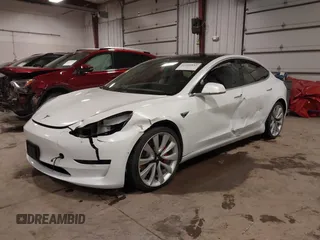 2018 Tesla Model 3 Long Range Battery with VIN 5YJ3E1EB5JF084446, listed as a IAAI auction lot 41209852 with 70,125 mi miles and . Bid and sale history available at DreamBid. Image 22.