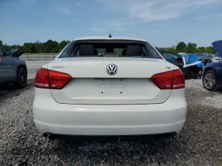 2014 Volkswagen Passat Wolfsburg Edition with VIN 1VWAT7A39EC081810, listed as a Copart auction lot 62676645 with 121,642 mi miles and Salvage title. Bid and sale history available at DreamBid. Image 6.